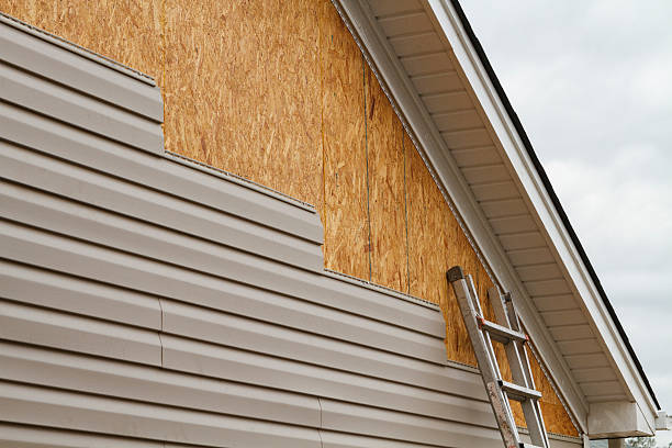 Professional Siding technician working in Westernport, MD